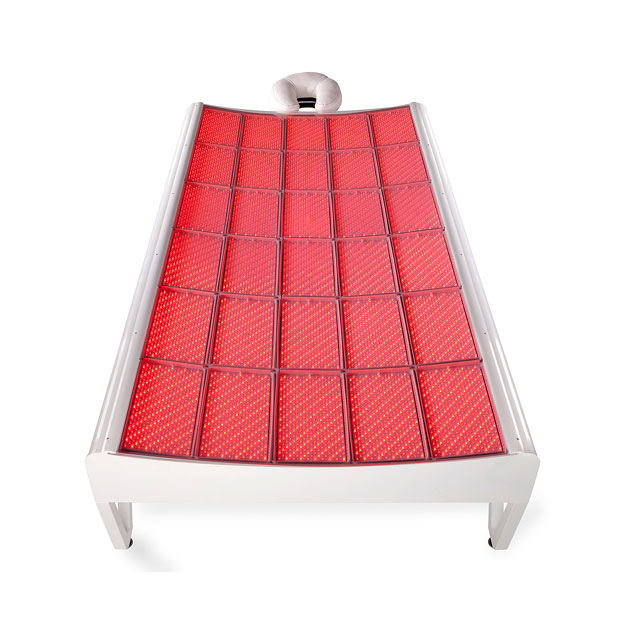 A woman enjoying a Red Light Therapy by LightStim full-body session